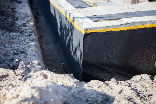 Professional Interior Drainage System technician working in Brandywine, MD